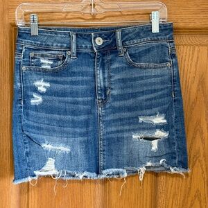 American Eagle Denim Mini Skirt Size 4 Blue Super Stretch Distressed Raw Hem